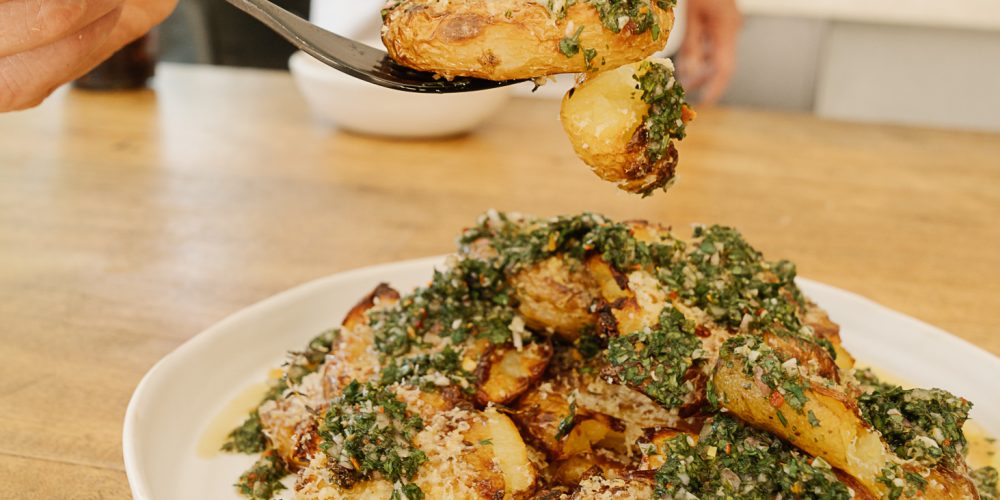 Smash roasted potatoes with chimichurri